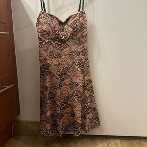 Short pink and black lace dress